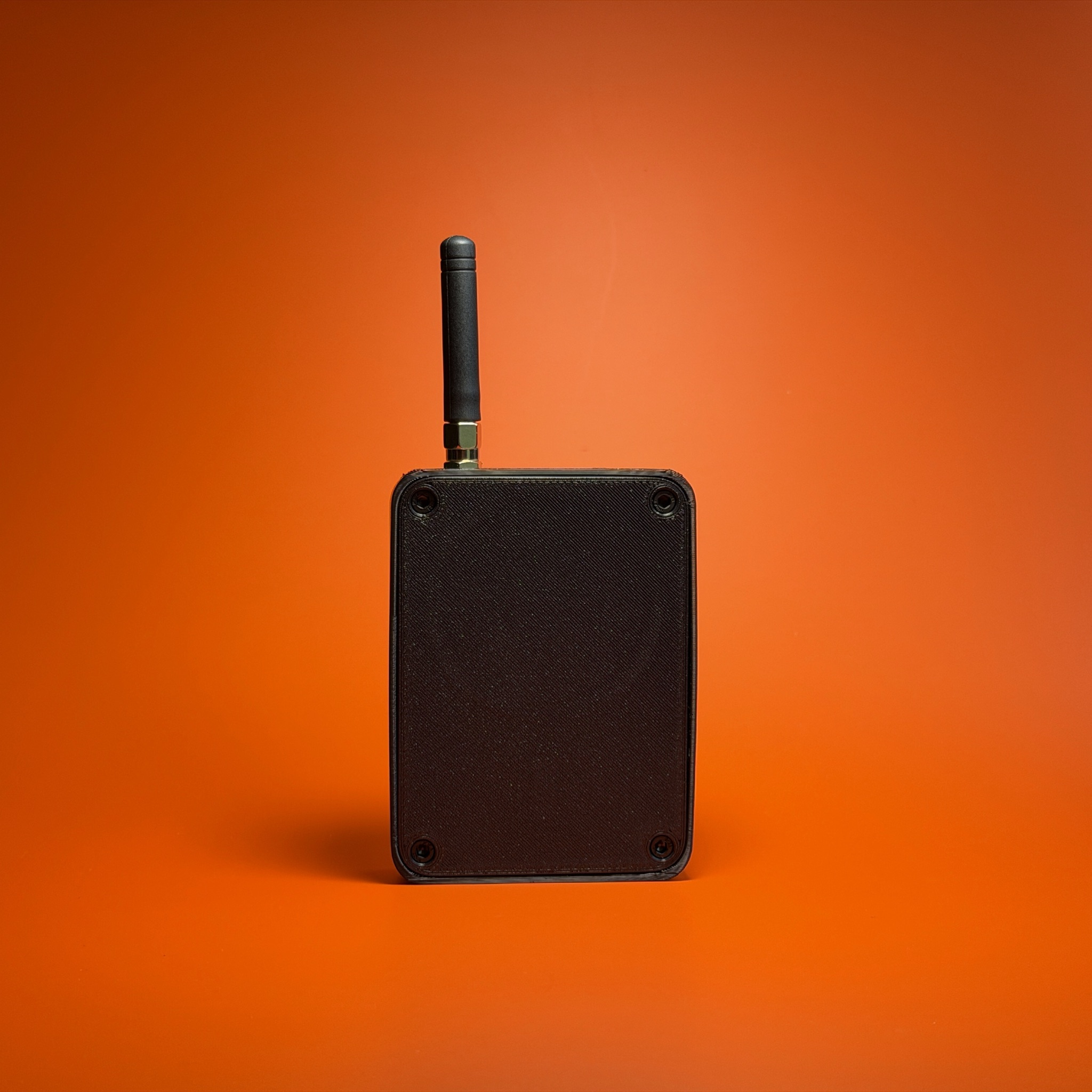 Back of Beacon 2 showing the magnet face and corner screws